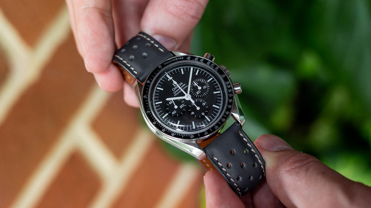 omega speedmaster black leather strap