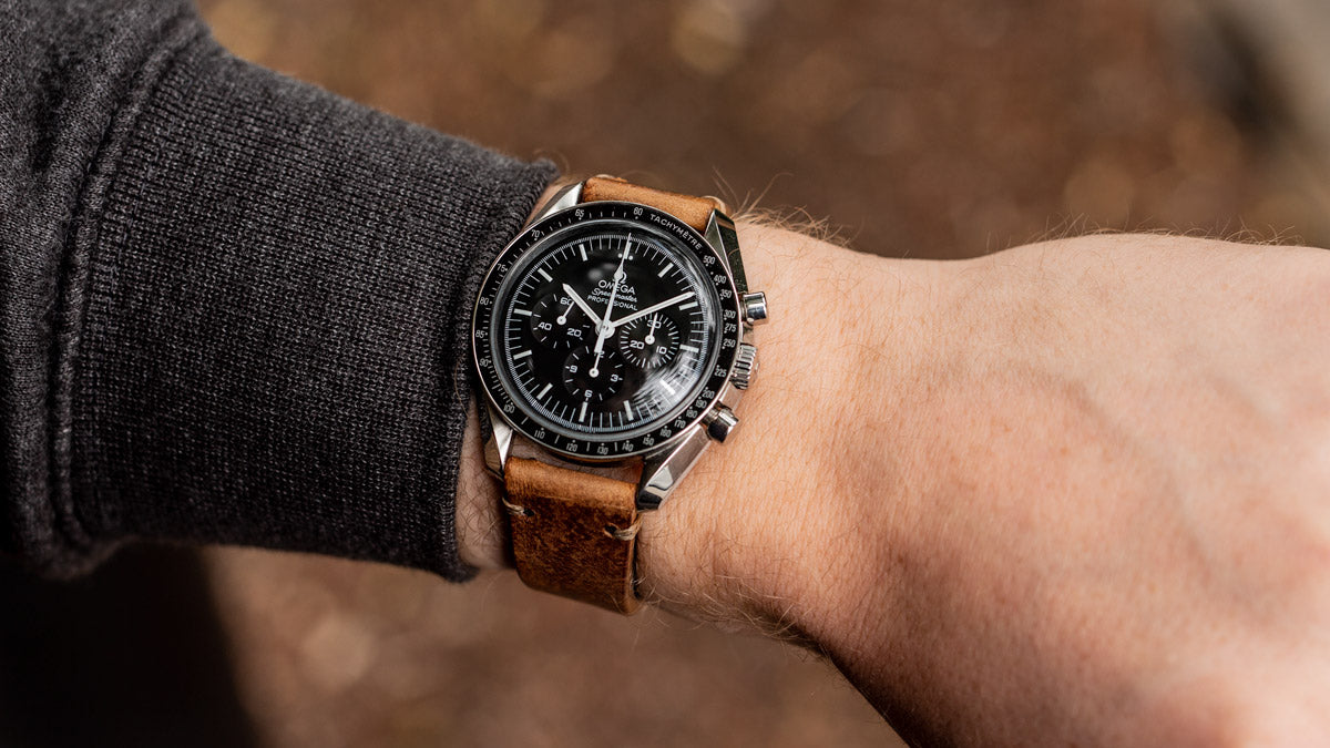 omega speedmaster with brown leather strap