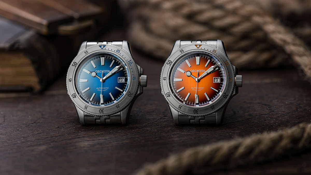 Two Geckota G-02 Steel watches on a table